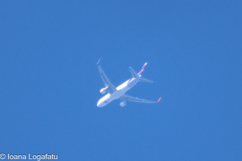 Airborne adventure under a clear blue sky